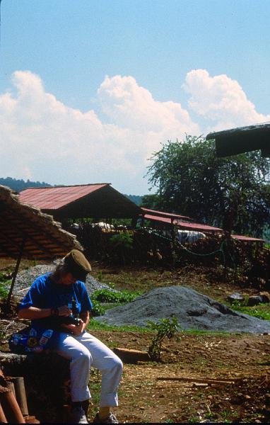 0190-Judy at ciac, Centro de Investigacion Accion Comunitario, near Teposlan Mexico.jpg - Judy reloading film at ciac, Centro de Investigacion Accion Comunitario, near Teposlan Mexico.
